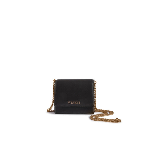 Veganluxe Lifestyle Private Limited Trundl sling bag in black leather with adjustable strap and minimalist design.