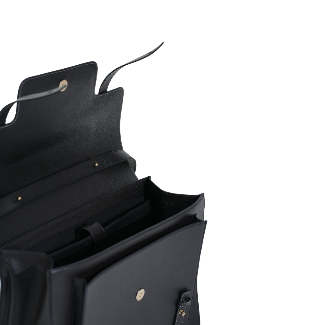 Veganluxe Lifestyle Private Limited Munim laptop bag in sleek black with leather accents and adjustable shoulder strap.