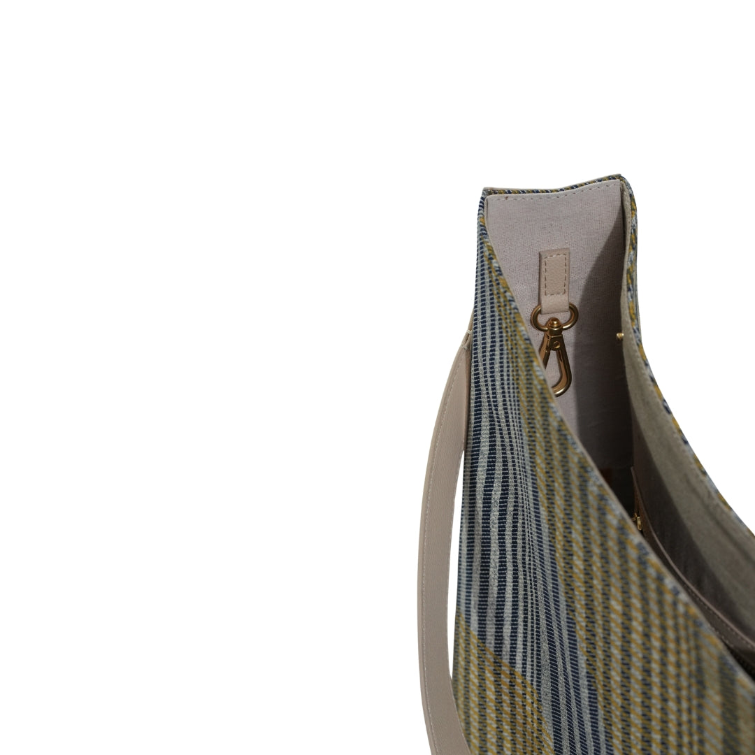 VYAKTI INDIA shoulder bag with stylish design, crafted from durable material, featuring a spacious interior and adjustable strap.