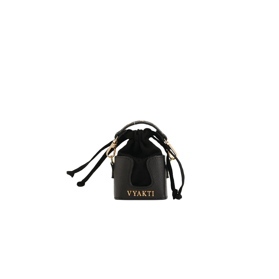 Mini Dorika by VYAKTI INDIA featuring colorful handcrafted embroidery on a small fabric pouch.
