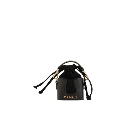 Mini Dorika by VYAKTI INDIA featuring colorful handcrafted embroidery on a small fabric pouch.