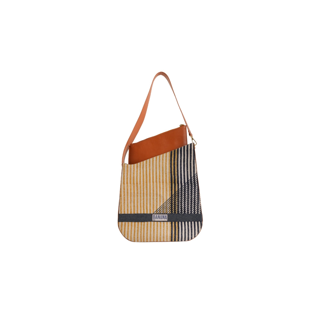 VYAKTI INDIA shoulder bag with vessel design, featuring a stylish and spacious leather-like material for everyday use.