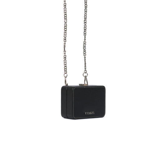Veganluxe Lifestyle Dibbi crossbody bag in sleek black with adjustable strap and minimalist design.