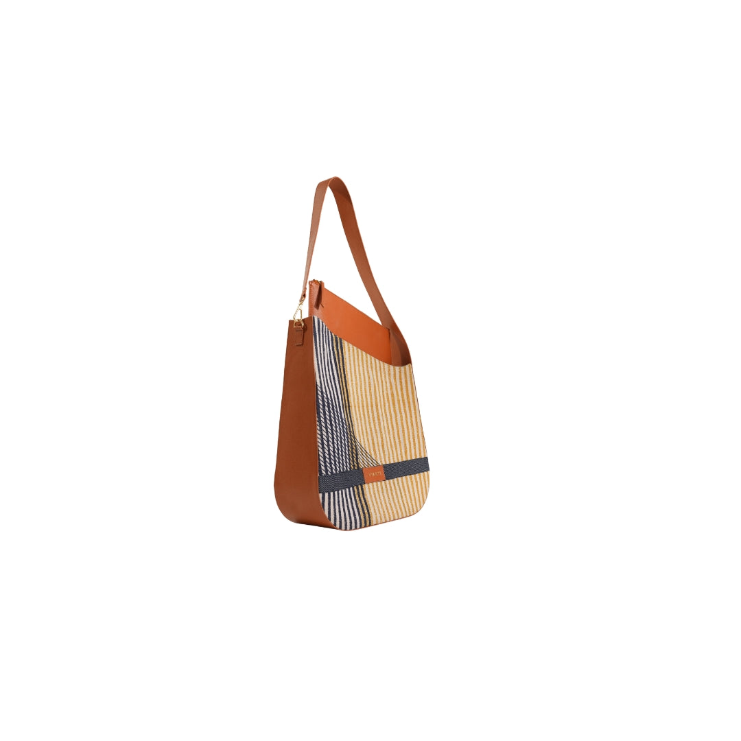 VYAKTI INDIA shoulder bag with vessel design, featuring a sleek strap and stylish fabric exterior.