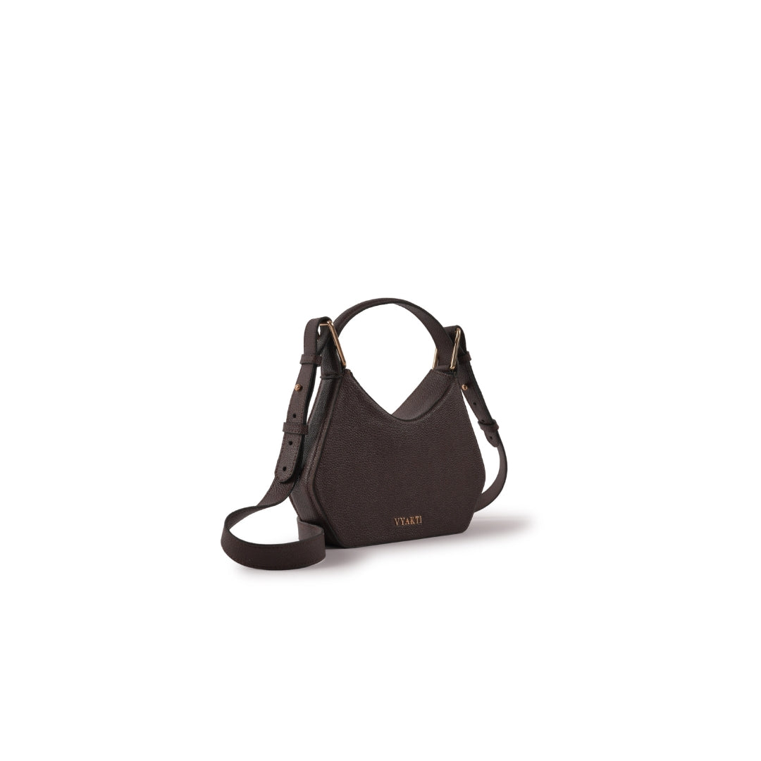 Veganluxe Lifestyle Tetris crossbody bag with geometric block design, black and white color scheme, and adjustable strap.