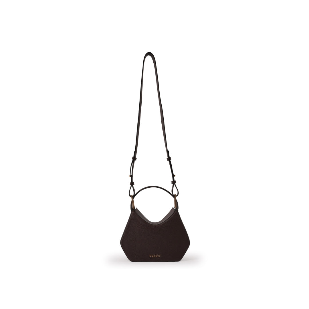 Veganluxe Lifestyle Tetris crossbody bag with colorful geometric pattern and adjustable strap, made from vegan leather.