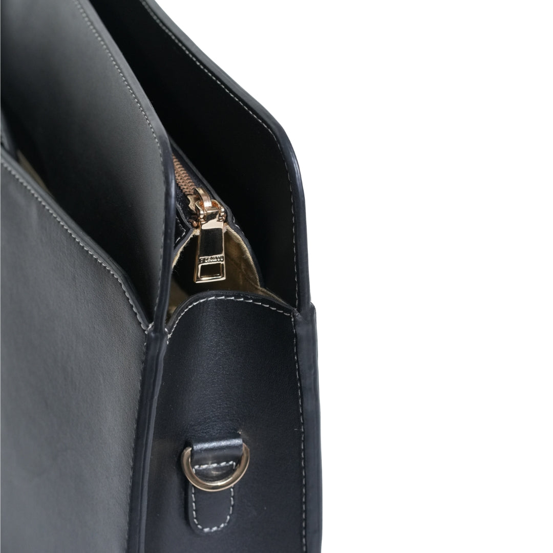 VYAKTI INDIA laptop briefcase bag with multiple compartments, black leather finish, and adjustable shoulder strap.