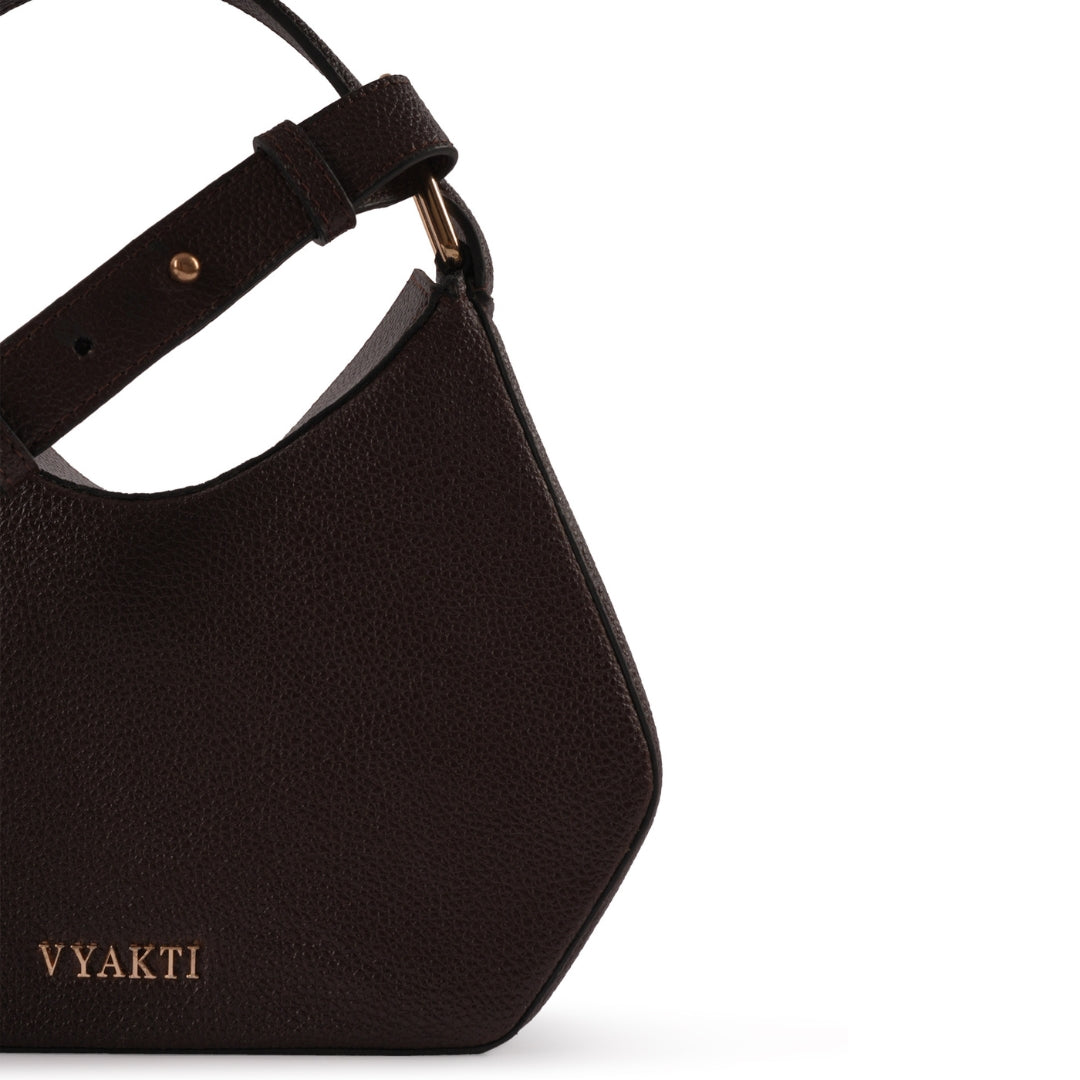 Veganluxe Lifestyle Tetris crossbody bag with colorful geometric pattern and adjustable strap, made from vegan leather.