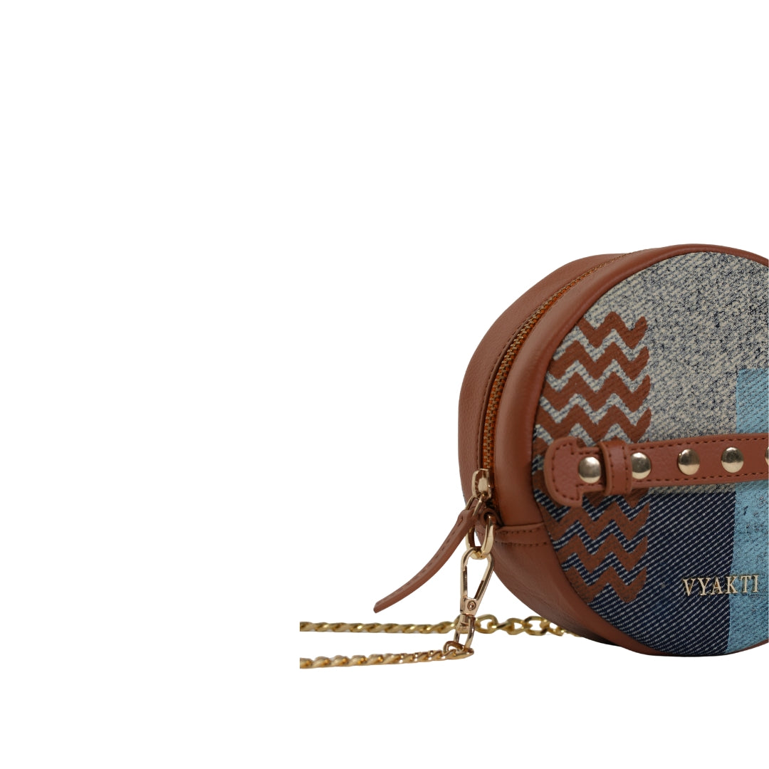VYAKTI INDIA Halo crossbody bag with sleek design, featuring a compact shape and adjustable strap, in a stylish color.