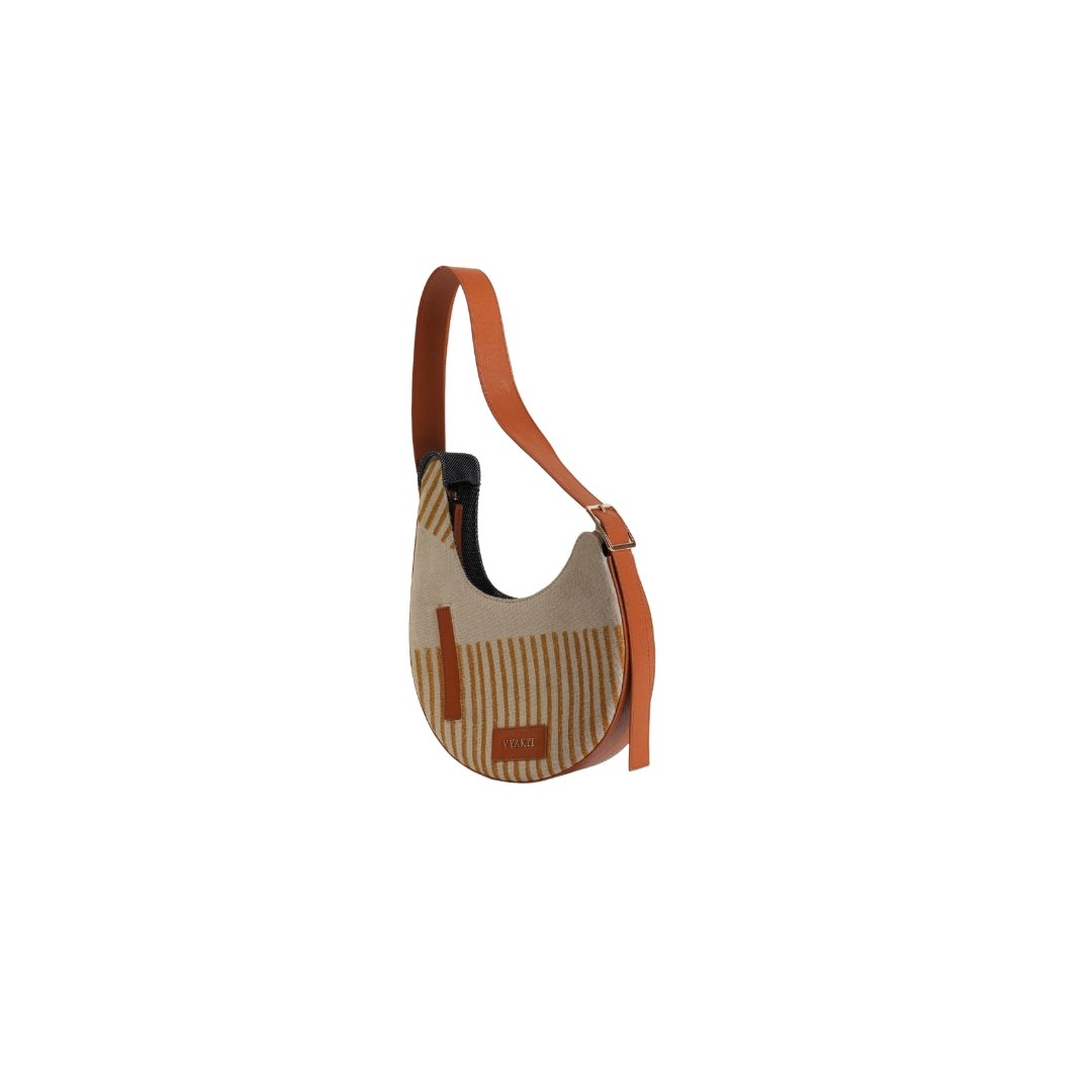 VYAKTI INDIA Dune shoulder bag with stylish design, featuring a sleek exterior and shoulder strap for versatile carrying.