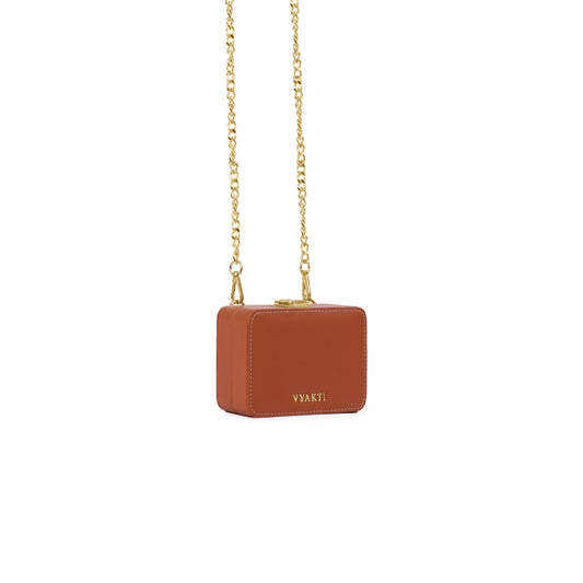 Veganluxe Lifestyle Private Limited Dibbi crossbody bag in sleek black with adjustable strap and minimalist design.