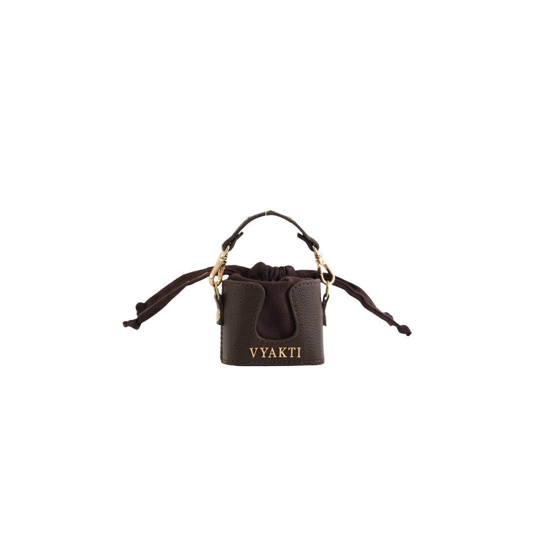 Mini Dorika by VYAKTI INDIA featuring intricate designs and vibrant colors on a traditional craft item.